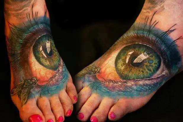 3d-colored-eye-tattoos-on-girl-feet